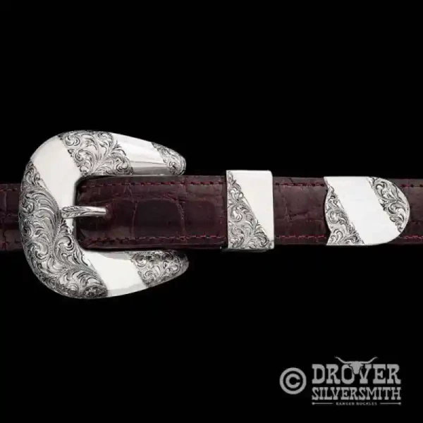 Discover The Top Hand Sterling Silver Buckle Set, a truly unique half polished half hand engraved buckle set perfect for a 1 inch width belt. Add a second loop for a ranger buckle set now!